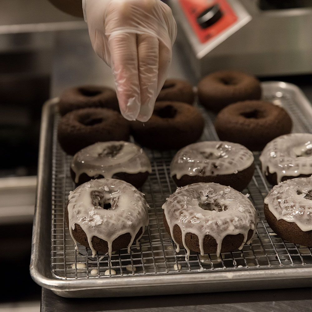 A photo of a bunch of Olivers Donuts together promoting catering